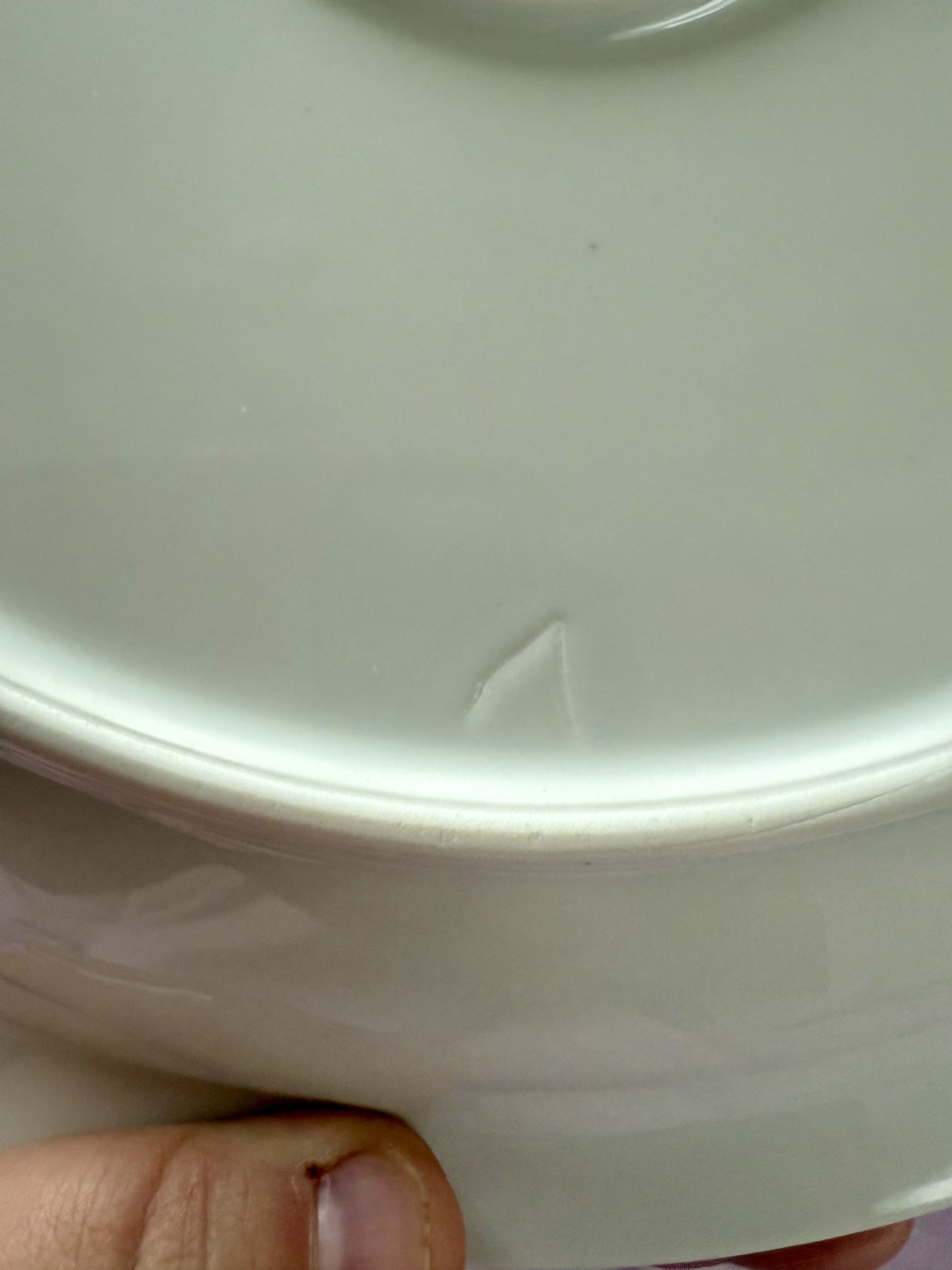 „Könnte eine handschriftliche 1“ sein auf der großen runden Platte