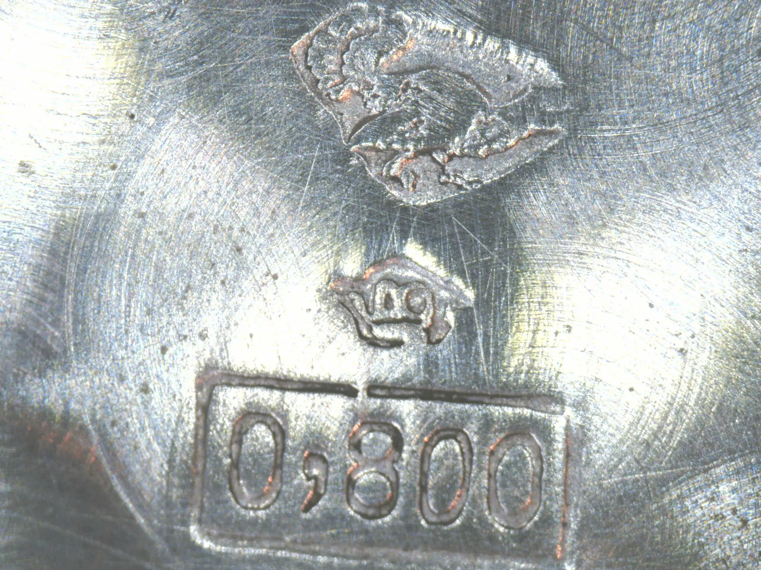 Lépine Alpina Logo zwischen Auerhahn und 0,800