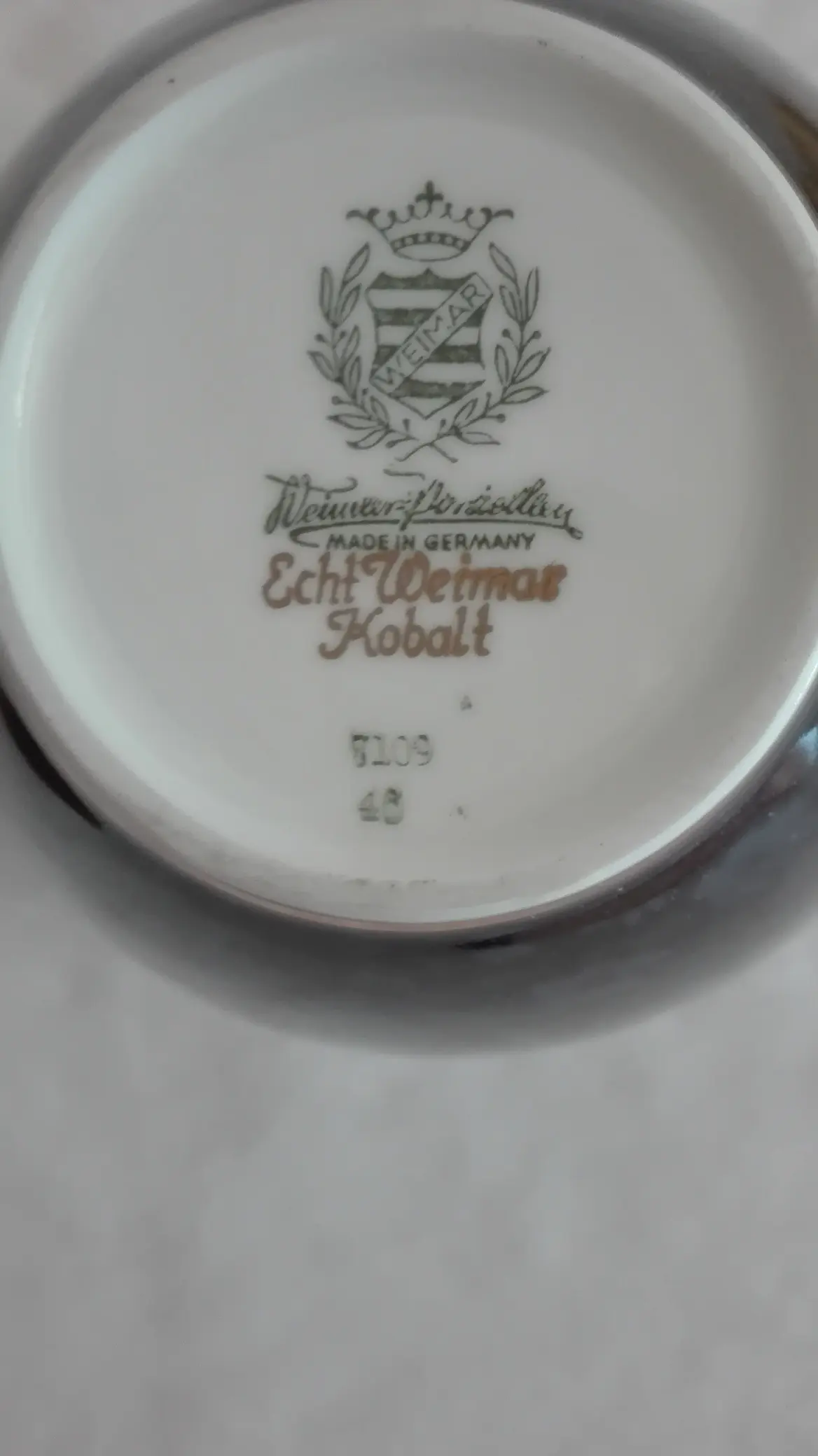 Stempel unter Kanne